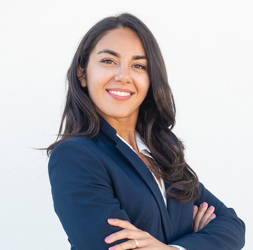 smiling-confident-businesswoman-posing-with-arms-folded (1) Team image 4
